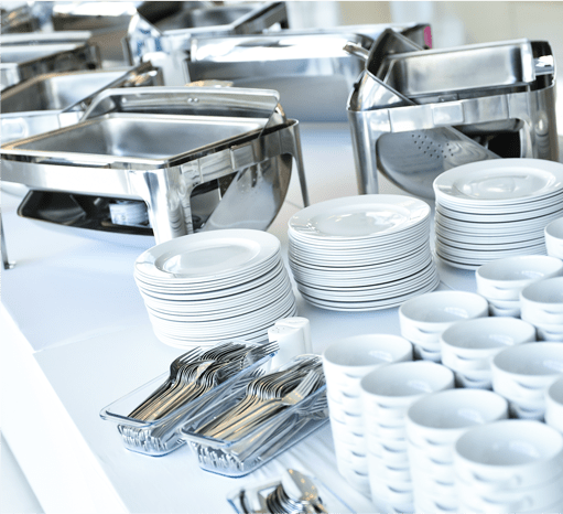 stacks of clean dishes and silverware