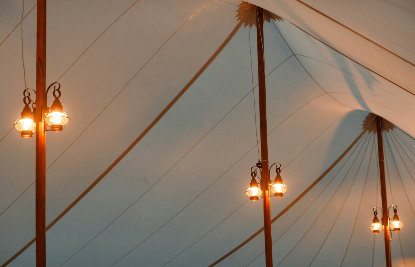 Onion lamps illuminating white tent