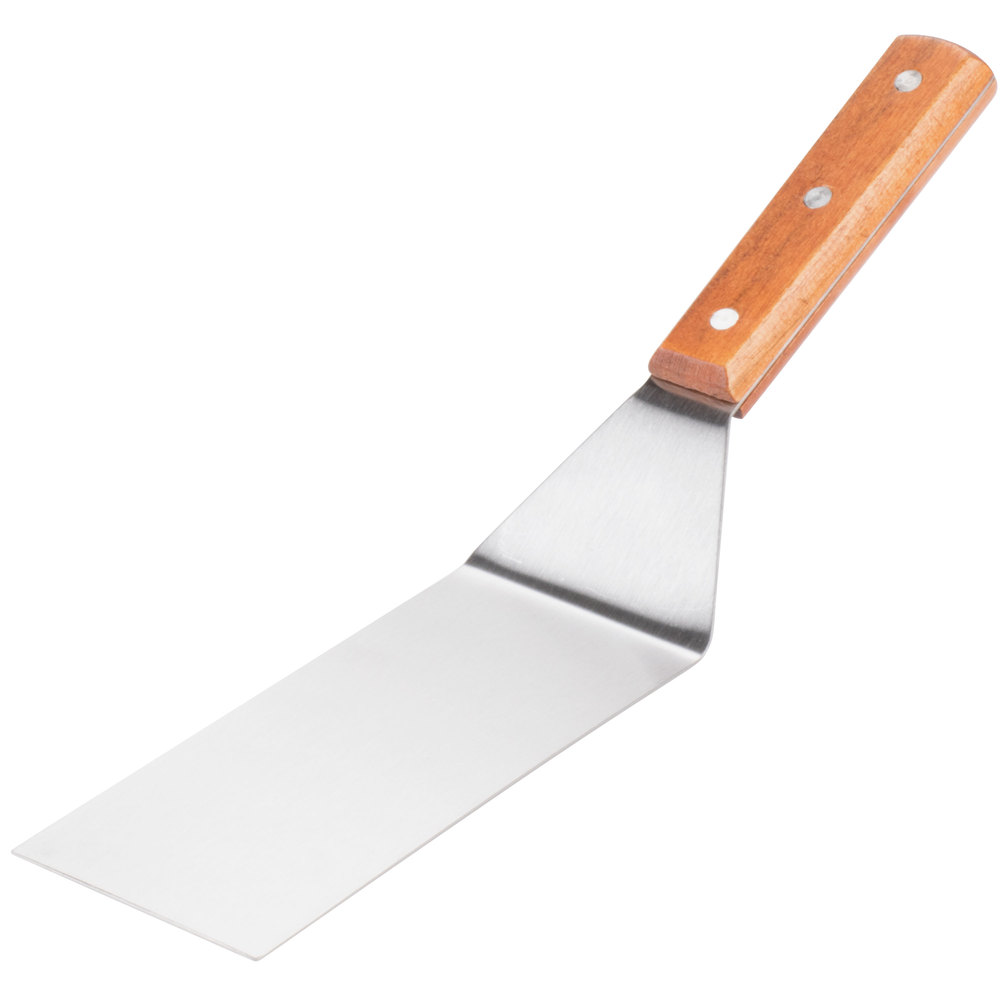 silver spatula with wooden handle