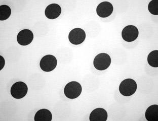 white linen with black polka dots