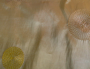 gold taffeta fabric with gold circles