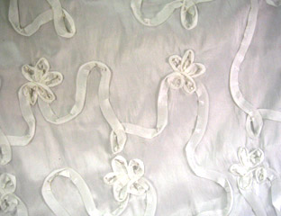 white ribbon pattern fabric